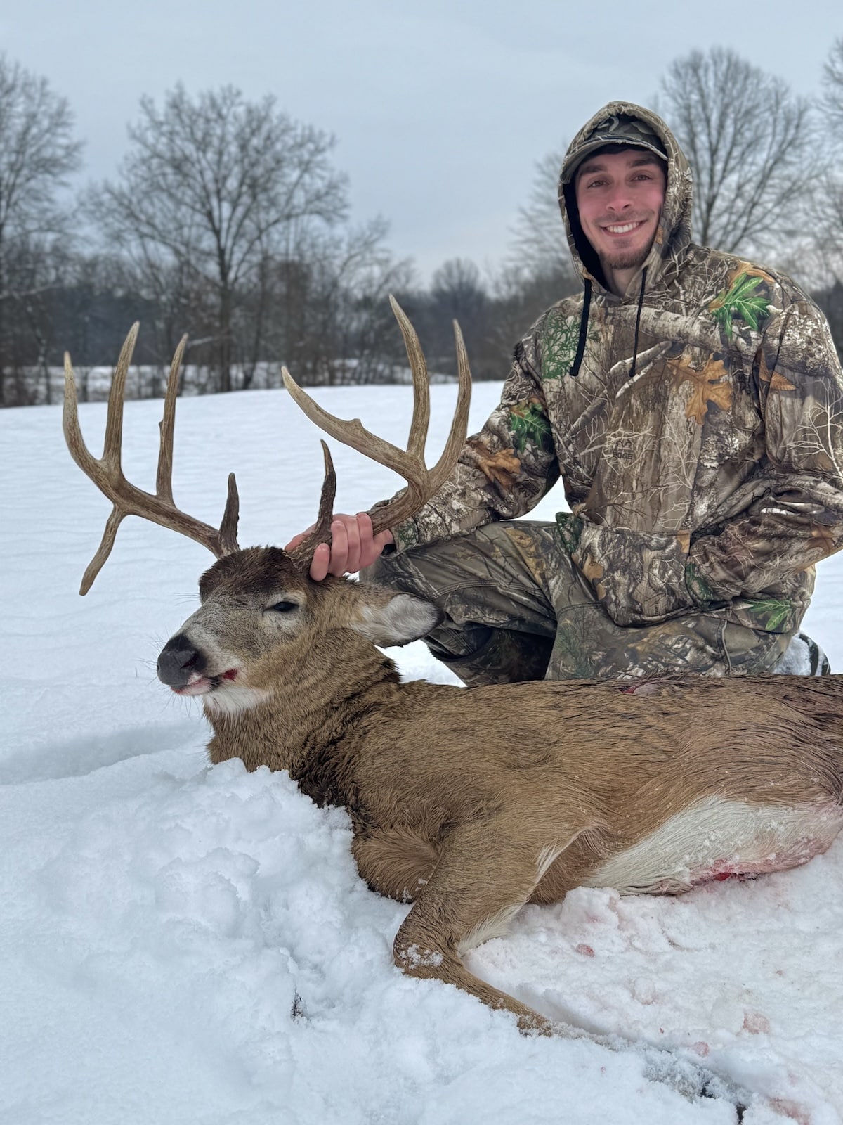 Bowhunter Arrows Non-Typical Drop Tine Buck in the Snow - HuntStand